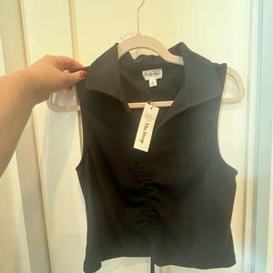 NWT collared sleeveless top with tie bottom